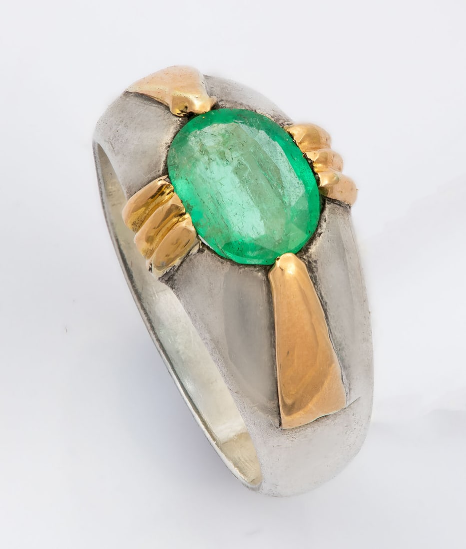 A Retro Silver Gold (18) and Emerald Ring: A Retro Silver Gold (18) and Emerald Ring