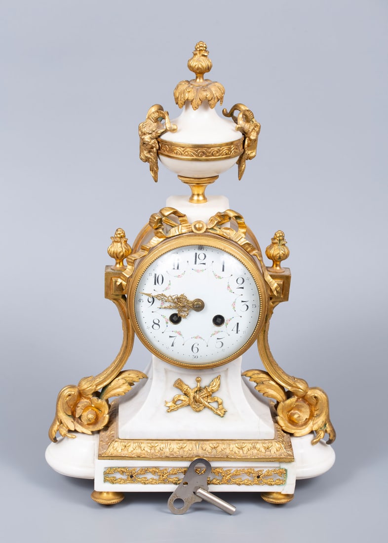A Louis XVI Style White Marble and Ormolu Mantel Clock, France, 19th Century: A Louis XVI Style White Marble and Ormolu Mantel Clock, France, 19th Century