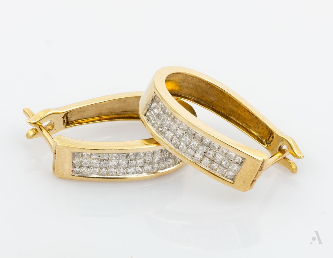A Pair of 10K Yellow Gold and Diamond Hoop Earrings: A Pair of 10K Yellow Gold and Diamond Hoop Earrings The front of the hoops inset and set with three rows of princess-cut diamonds in an invisible setting (approx. 0.5 Ct in total). Marked and gold aci
