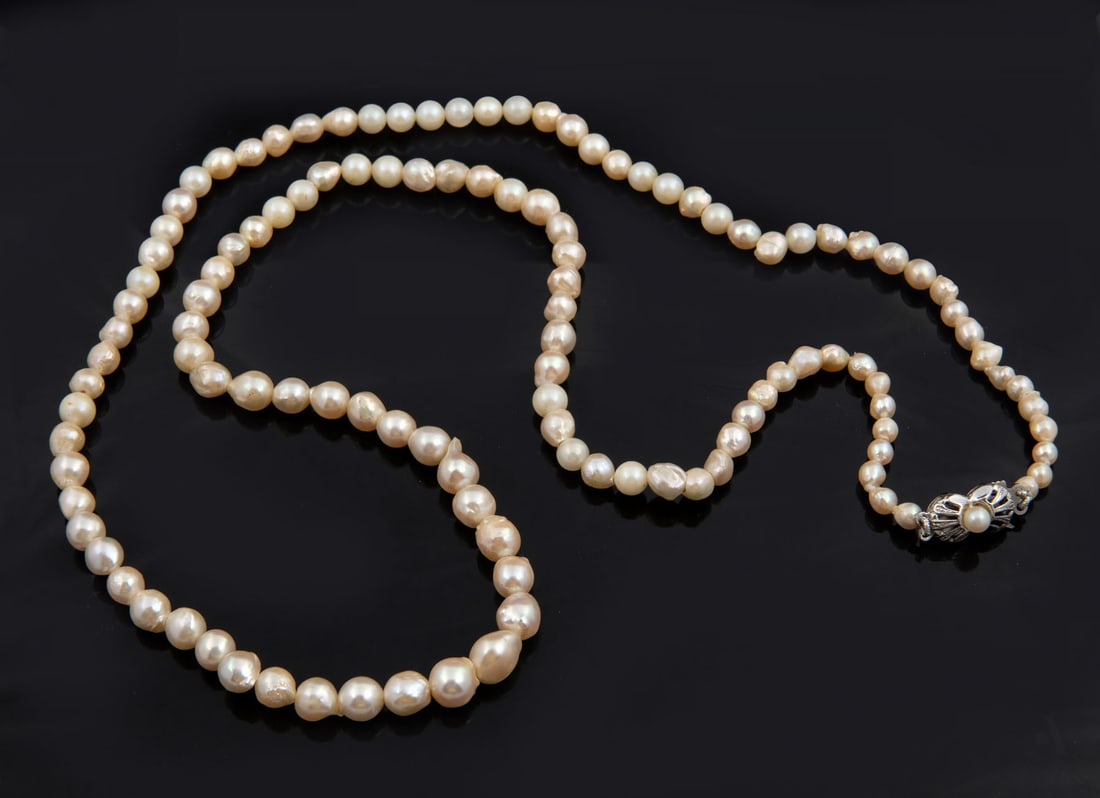 A Baroque Pearl Necklace with a Silver and Pearl Clasp (1 of 2)