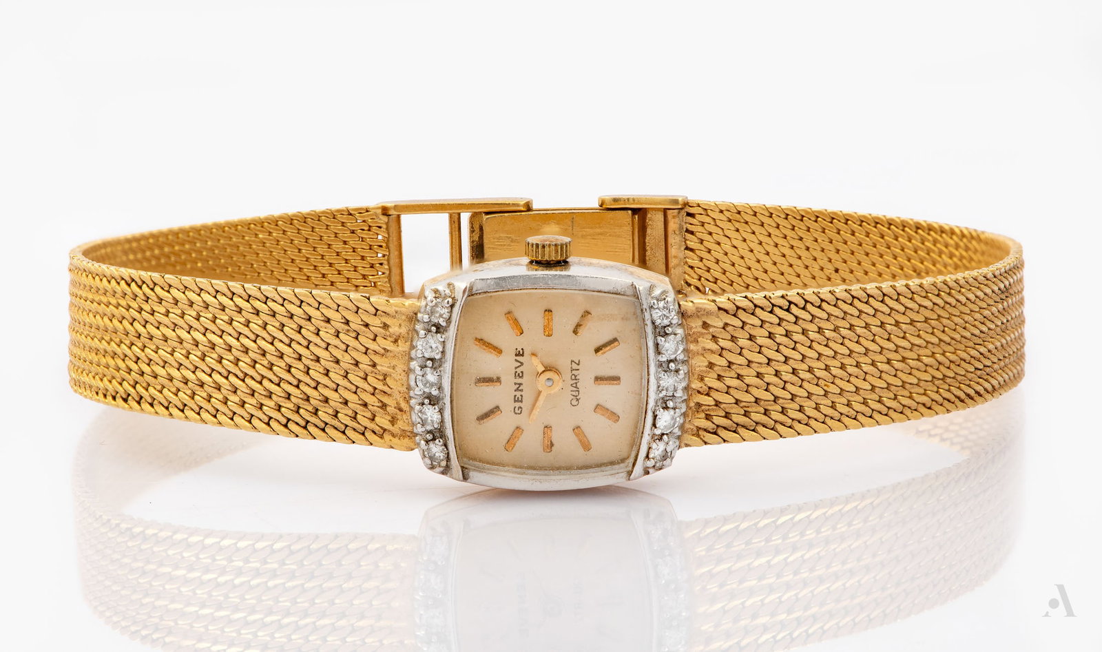 A Geneve 14K Two Tone Gold and Diamond Ladies' Wristwatch, 1970s: A Geneve 14K Two Tone Gold and Diamond Ladies' Wristwatch, 1970s Movement: Quartz Case: square case in yellow gold with a white gold bezel set with diamonds (approx. 0.1 ct. total), hallmarked and aci