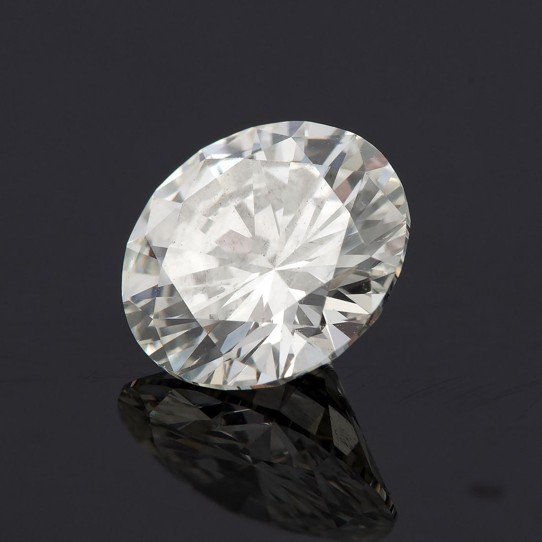 A Loose Brilliant-Cut Diamond, approx. 0.59Ct (1 of 3)