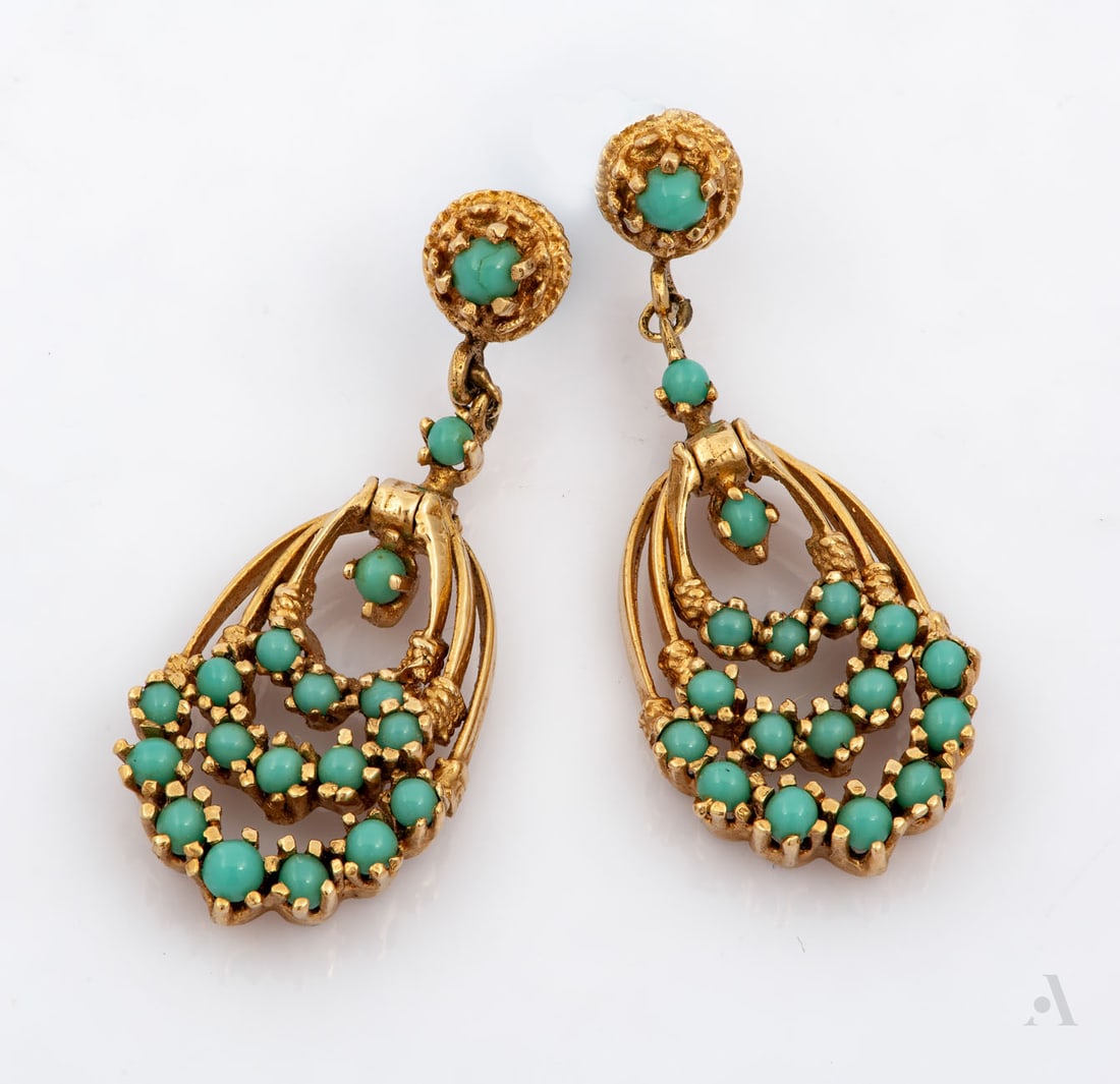 A Pair of 14K Yellow Gold and Turquoise Earrings: A Pair of 14K Yellow Gold and Turquoise Earrings Set with small turquoise stones. Gold acid tested. Total weight: 11 gr; length: approx. 4 cm Condition: For a full condition report please contact: off