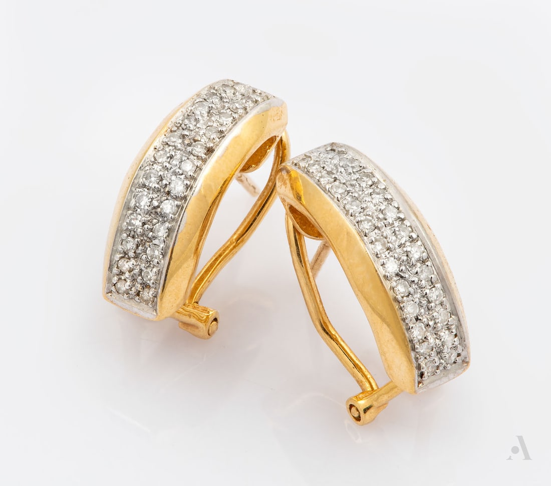 A Pair of 14K Yellow Gold and Diamond Earrings: A Pair of 14K Yellow Gold and Diamond Earrings A curved yellow gold element centered by a double row set with small round-cut diamonds (approx. 0.25 Ct in total), with clip-back fittings. Marked and g
