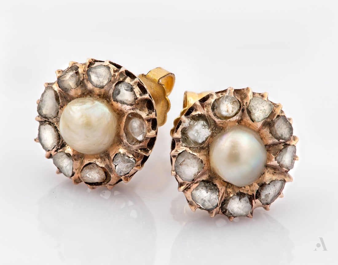 A Pair of Victorian 9K Red Gold Diamond and Pearl Earrings: A Pair of Victorian 9K Red Gold Diamond and Pearl Earrings Each set with a central pearl within a surround of diamonds, completed by gilt backs. Gold acid tested. Diameter: approx. 12 mm; Total weight