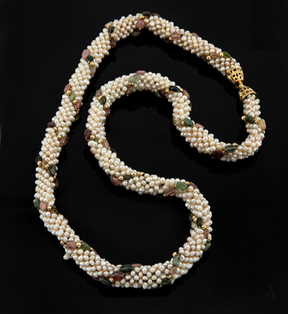 A Fine 14K Gold Pearl and Tourmaline Torsade Necklace: A Fine 14K Gold Pearl and Tourmaline Torsade Necklace Composed of numerous cultured pearl strands, accented throughout with faceted tourmaline beads in varying shades of green and pink in between gold