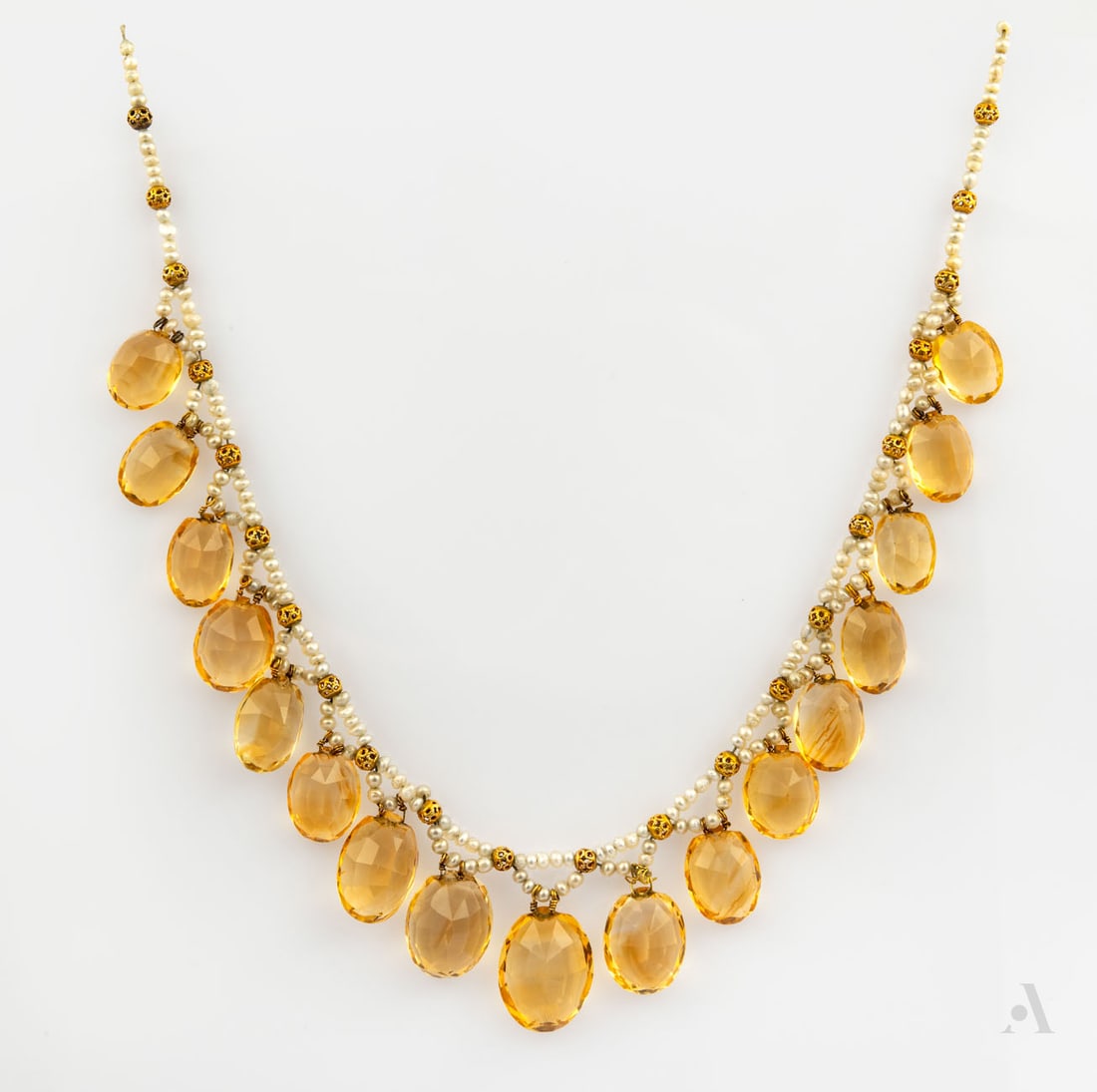 A Victorian 14K Yellow Gold Citrine and Natural Pearl Fringe Necklace: A Victorian 14K Yellow Gold Citrine and Natural Pearl Fringe Necklace Designed as a fringe necklace composed of multiple strands of natural seed pearls (pearl diameter: 2â€“2.5 mm), accented b