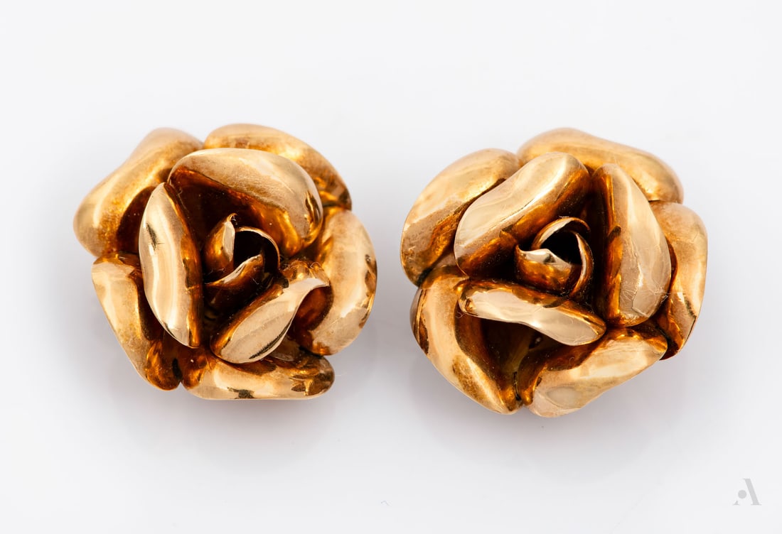 A Pair of Vintage 14K Rose Gold Earrings: A Pair of Vintage 14K Rose Gold Earrings Designed as roses, fitted with clip backs without posts. Gold acid tested. Weight: 8.98 gr; diameter: approx. 2.2 cm Condition: For a full condition report ple