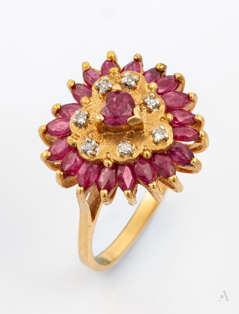 A Vintage 14K Yellow Gold Diamond and Ruby Ring: A Vintage 14K Yellow Gold Diamond and Ruby Ring Heart shaped head, centered by a heart-cut ruby within a halo of small round diamonds and an outer halo of marquise-cut rubies. Marked and gold acid tes