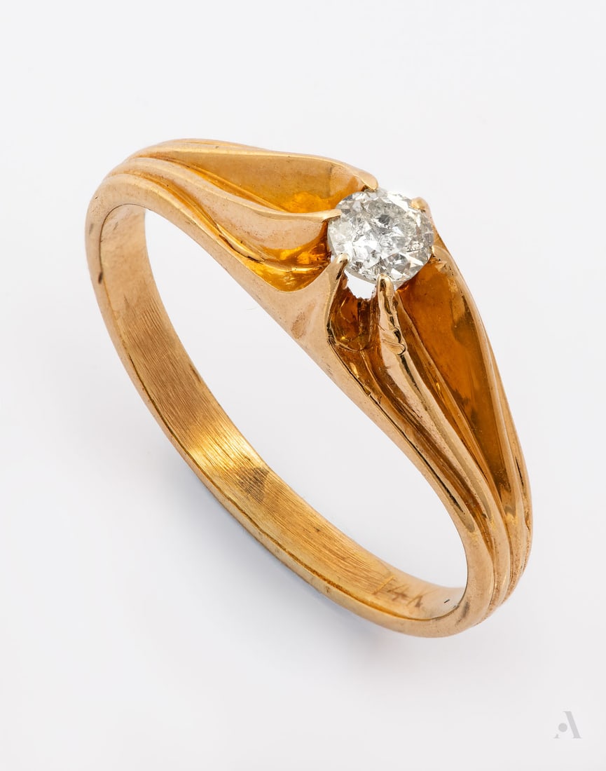 A 14K Rose Gold and Diamond Solitaire Ring: A 14K Rose Gold and Diamond Solitaire Ring Designed with a grooved pattern, centered by an old-cut diamond (approx. 0.1 Ct). Marked and gold acid tested. Total weight: 3.2 gr; ring size: 7.25 Co