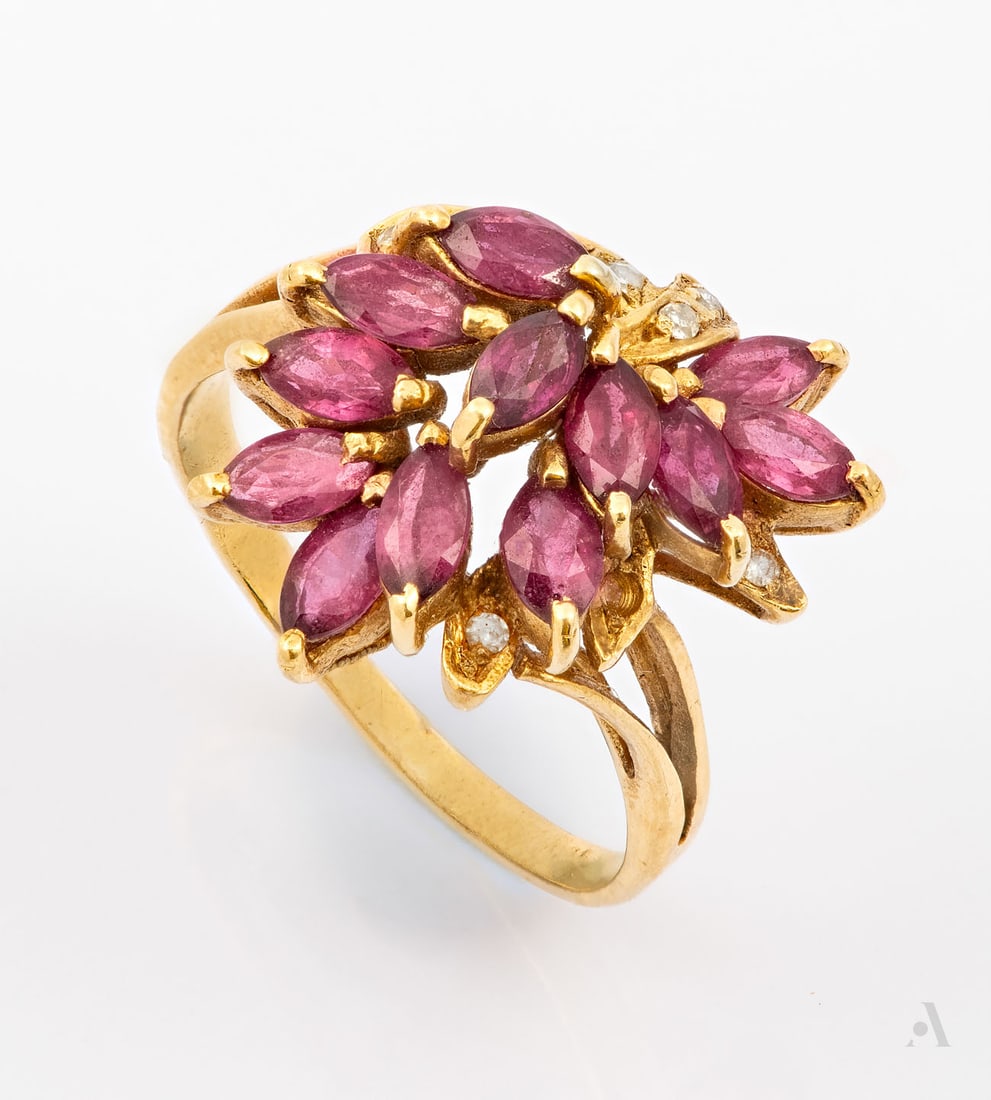 A 14K Yellow Gold Tourmaline and Diamond Spray Ring: A 14K Yellow Gold Tourmaline and Diamond Spray Ring The head set with a cluster of pink marquise-cut tourmalines accented by small round diamonds. Marked and gold acid tested. Total weight: 3.65 gr; r