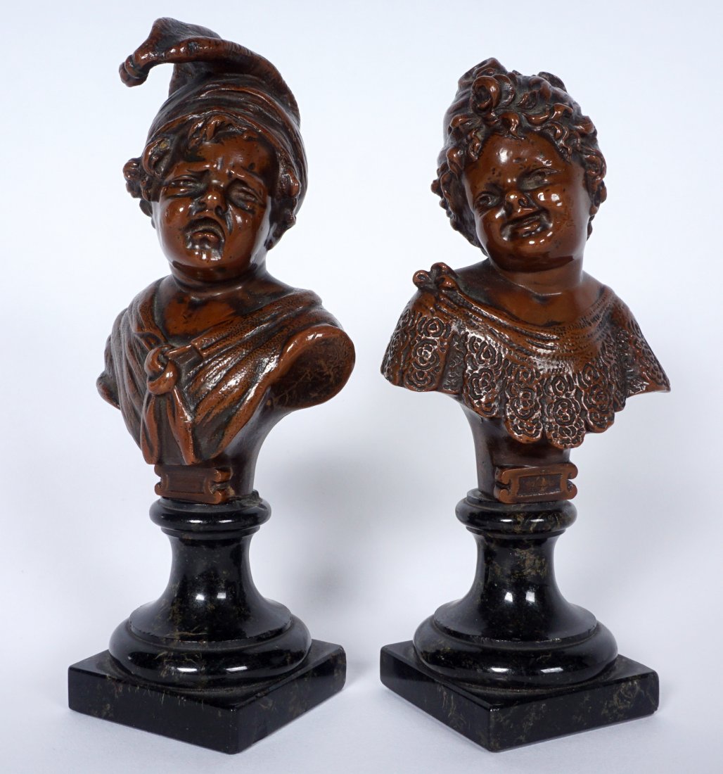 Pair Miniature Bronze Busts Of Boy & Girl: PAIR MINIATURE BRONZE BUSTS OF BOY & GIRL: Bronze figural busts of a boy crying with nightcap on and girl smiling, affixed to marble plinths, no visible signatures or marks. Each measure 5 1/8” h.