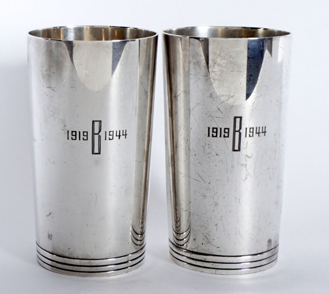 Pair Tiffany & Co. Sterling Mint Julep Cups: PAIR TIFFANY & CO. STERLING MINT JULEP CUPS: Pair of mint julep or tumblers, well marked with typical Tiffany marking, #22394, monogrammed B and engraved dates 1919-1944. Each measure 5 ¼” h. x 3��