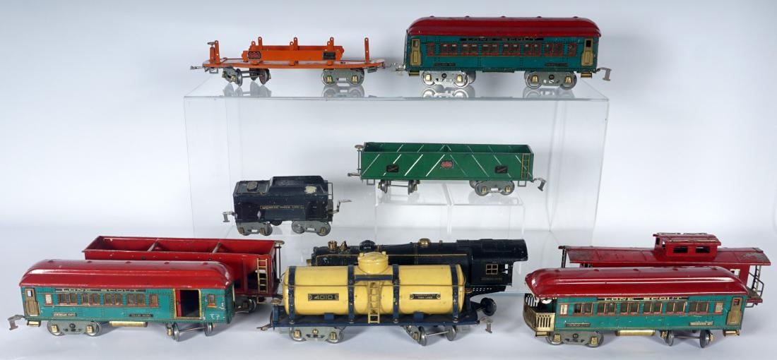 Vintage 10 Piece American Flyer Train Set: VINTAGE 10 PIECE AMERICAN FLYER TRAIN SET: Post war production, standard gauge, 10 pieces total to include 1) 4-4-2 McCoy engine 4680, black with green stripe, 5 ¼ h. x 16 ½” x 4”. 2) Matching t
