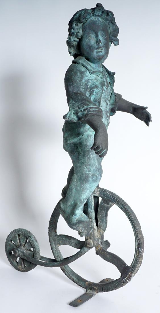 Garden Sculpture Bronze Boy on Bike: Figure of a boy on pennyfarthing type bike with no handlebars, no visible signature, 31.25" h. x 12" x 19.5". Condition: Obvious weathering.