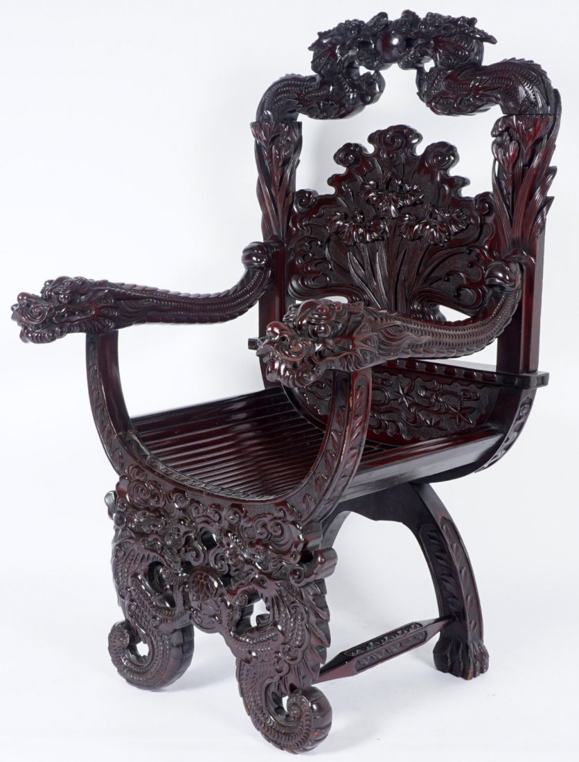 Chinese Carved Dragon Thorne Chair: Circa late 19th to early 20th Century, stylized figural dragon top rail over floral panel. Shaped arms ending in dragon heads, wood seat in a bamboo motif, openwork front skirt, carved back legs, over