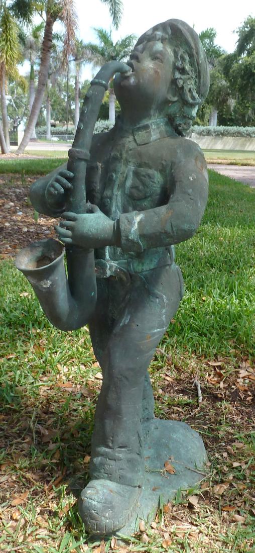 Garden Sculpture Bronze Boy with Saxophone: Figure of a standing boy playing a saxophone, no visible signature, 37" h. 15.5" x 20". Condition: Obvious weathering.