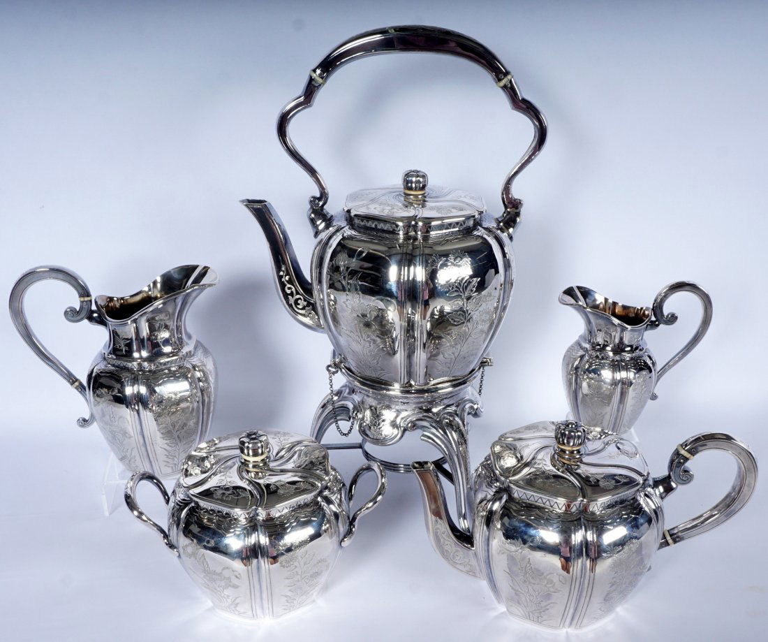 French Touron 5 Piece Silver Tea Service: 5 pieces total by Touron, France, with .950 Minerva standard, to include 1) Hot water kettle on stand, hinged lid, no burner, 13.5" h. x 8.25". 2) Teapot with hinged lid, 5" h. x 8.75". 3) Covered sug