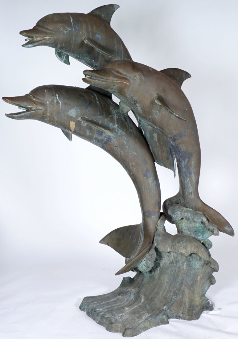 Large Triple Dolphin Bronze Outdoor Fountain: Three leaping dolphins and waves, no visible signature, approx. 82" h. x 40" x 56" Condition: Weathering.