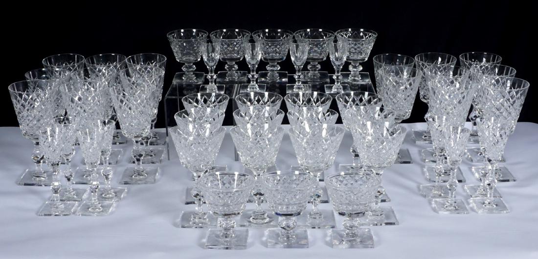 45pc Hawkes Delft Diamond Crystal Stemware: 49 pieces total, 45 in the Delft Diamond pattern by Hawkes to include 17 water (7.75"), 12 wine (6.5"), 8 sherbet/champagne (4.25"), 8 cordial (6"). Sold with 4 cordials of another pattern. Conditon: