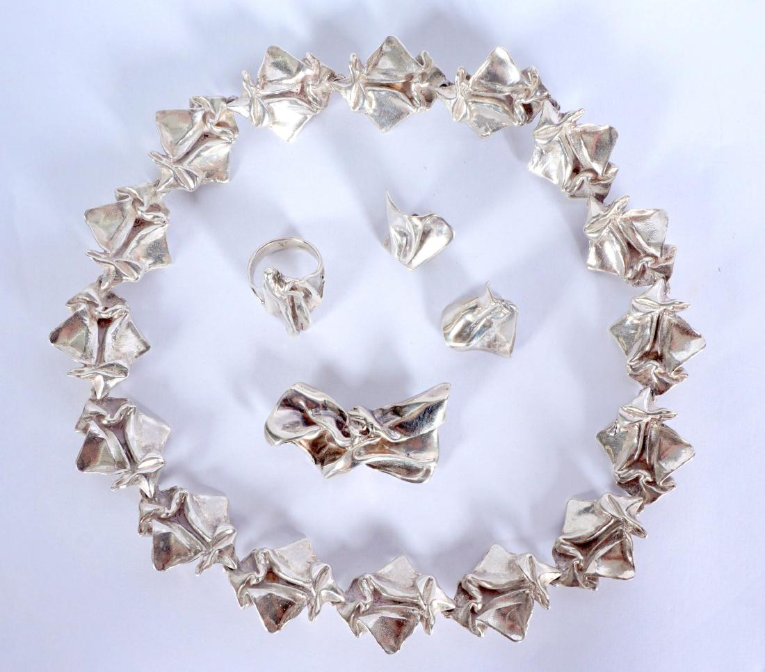 Vicki Thaler Mountain Reflections Sterling Jewelry: From the Mountain Reflections collection, 5 pieces total to include 1 necklace, 1 ring, 1 pin, and 1 pair of earrings. Necklace measures 16-1/4"in length. Each link measures approximately 1" x 1". The