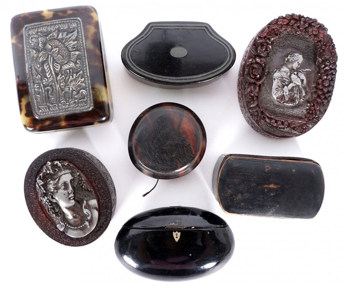 Collection of 6 French Trinket Boxes: An assembled collection of 6 French trinket boxes, assorted construction to include amber colored molded plastic (Bakelite?), wood, and faux tortoise shell. Largest box measures 1" h. x 2.75" x 2". So