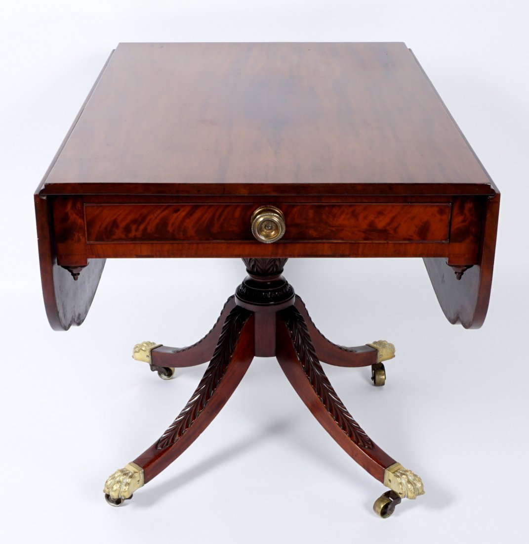 Elam Williams Labeled Federal Breakfast Table: School of Duncan Phyfe, Elam Williams paper label remains inside single drawer, No. 167 Williams Street New York.. Mahogany top, shaped drop leaves, turned pedestal, carved splayed feet ending in gilt