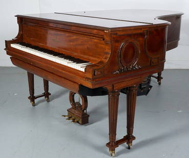 1922 Steinway Model B Mahogany Grand Player Piano: Richly grained mahogany with applied carved floral wreath medallions on side panels, lyre foot pedal support, fluted legs. Fitted with a Duo-Art player mechanism. Serial number 206269, dates to 1922.