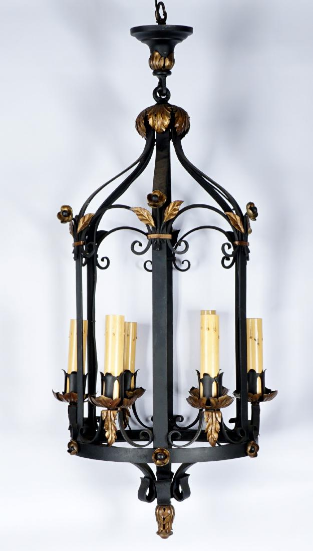Wrought Iron Hanging Lamp: Cage form flat wrought iron bars with gold painted leaves decoration, 6 lights, 33" x 16".