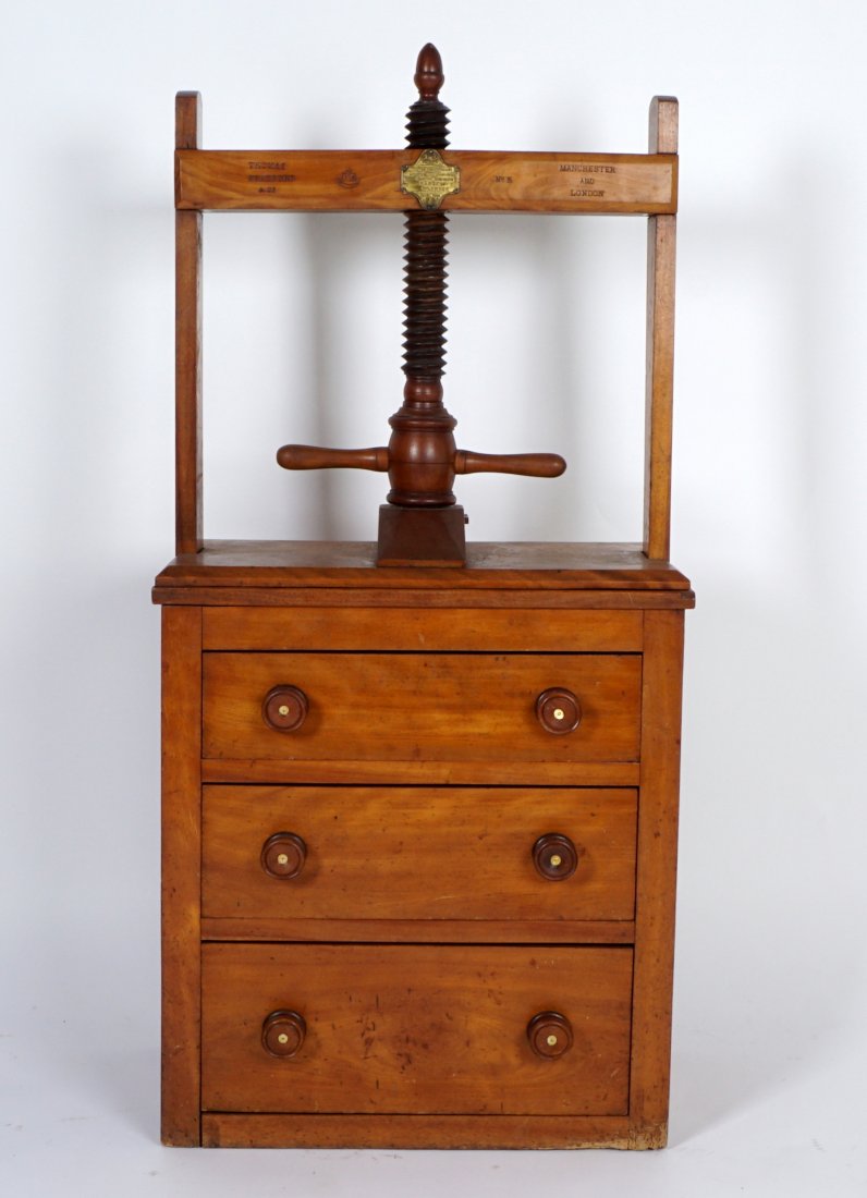 Thomas Bradford & Co. No 5 Laundry Press Cabinet: Top with screw laundry or linen press over 3 drawers, wood pulls, well marked Thomas Bradford & Co. with additional logo, Manchester & London, No. 5, and brass plaque. Overall measures 58" h. x 25.5 "