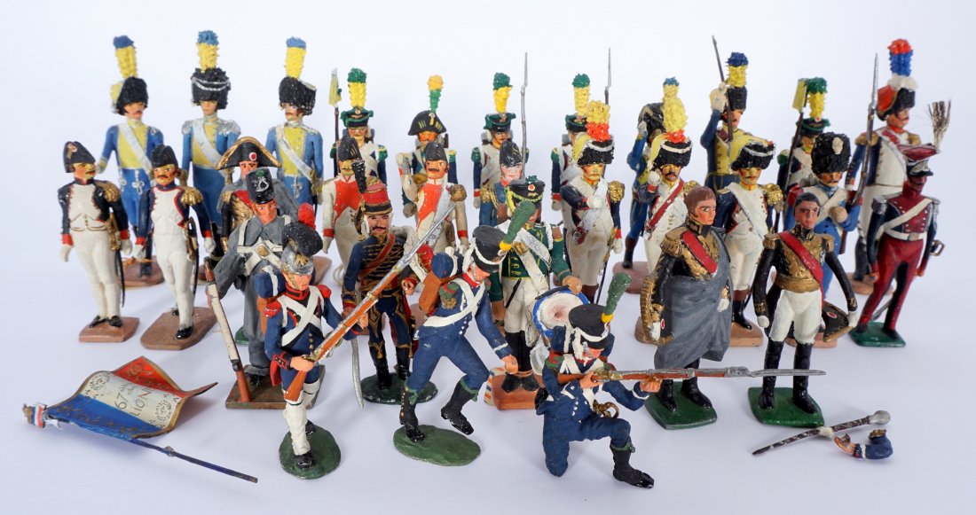 Collection of 30 French Ballada Toy Soldiers: An assembled collection of 30 hand painted soft metal toy soldiers and musicians, 1 loose flag. Tallest figure 3.5" h.. Condition: Hand painted, some wear to paint, sold as-is.