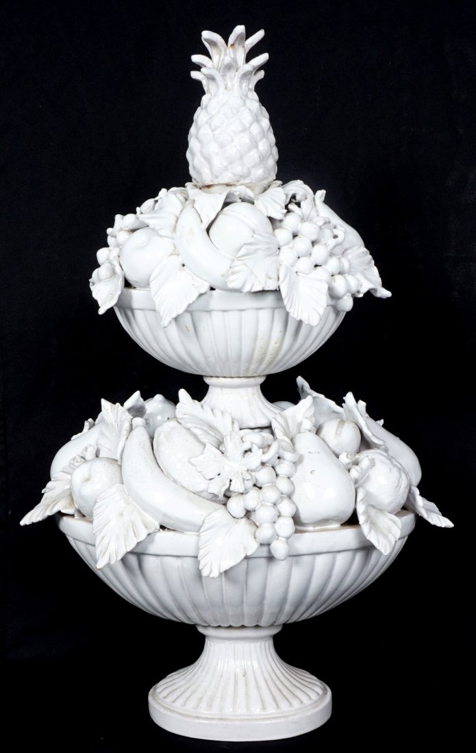 Blanc de Chine Porcelain Fruit Centerpiece: 2 piece blanc de chine centerpiece featuring fruit and grape vines, 26.5" h. x 17". Condition: Multiple chips and repairs.