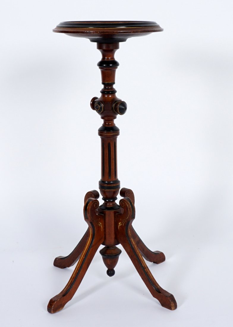 Herter Brothers School Stand With Bronze Plaque: Carved walnut stand, bowl top with neoclassical scene bronze medallion, carved and turned column shaft, 4 splayed legs, ebonized accents, 32.5" h. x 19.5" base dia. Condition: Scratches, other wear co