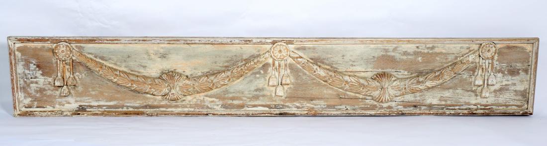 19th C French Whitewashed Carved Wood Frieze Panel: Large wood panel with carved garland swags and tassels, white wash painted. 14.25" h. x 95" x 3.25". Condition: Loss of paint and wear, several screw repairs to back support.