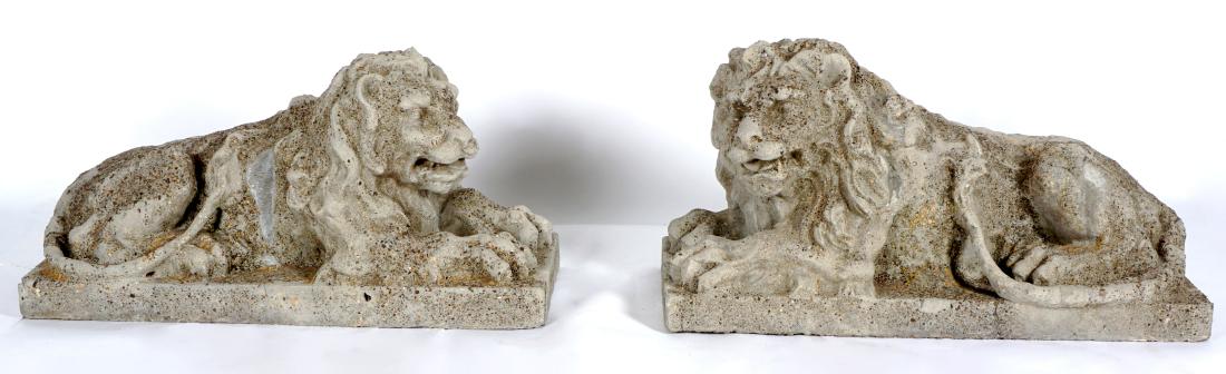 Pair Concrete Recumbent Lions Garden Sculptures: Mirror image pair of resting lion garden statuary, each measures 21" h. x 17" x 40". Provenance: Purchased in 1990 from England for £3,000 GBP. Condition: Both with weathering, one with repair to sid