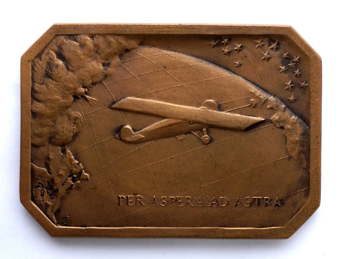 Charles Lindbergh Atlantic Crossing Bronze Medal: Designed by John Gregory, Obverse with the Spirit of St. Louis flying over the globe and motto Per Aspera Ad Astra, reverse with commemoration statement by the Aeronautical Chamber of Commerce of Amer