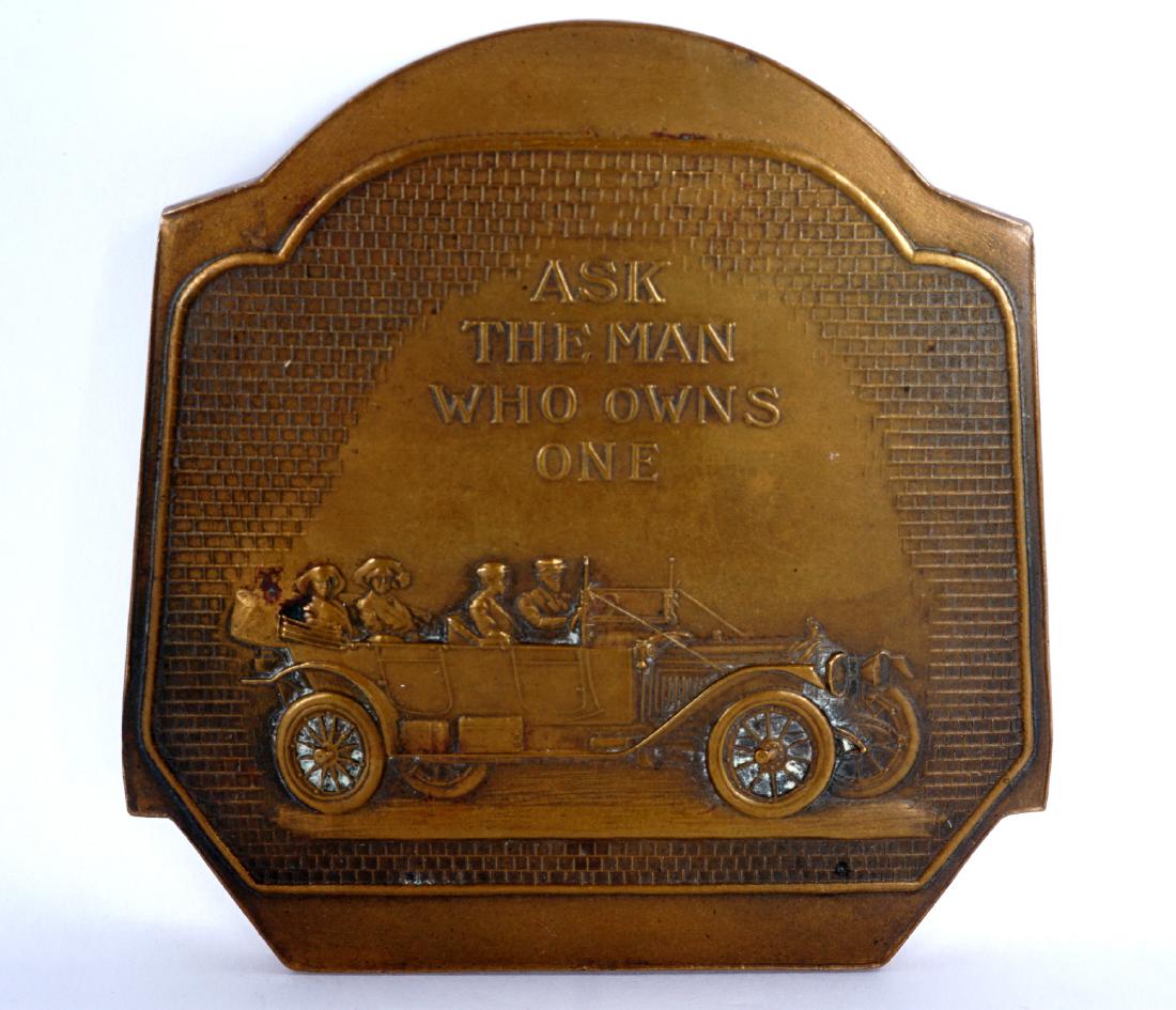 Packard Phaeton Bronze Advertising Paperweight: Circa 1913 Packard bronze paperweight featuring a Phaeton model and motto "Ask the Man Who Owns One". On four ball feet, marked Whitehead - Hoag on edge, 3.5" x 3.5".