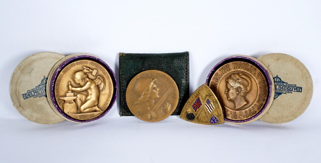Collection of 4 European Medals & Pin: An assembled collection of four pieces total to include 1-2) Pair Dutch industry bronze medals, Obverse reads "In Remembrance of the Visit of Holland of the U. S. American Railroad Officials Oct. 16th