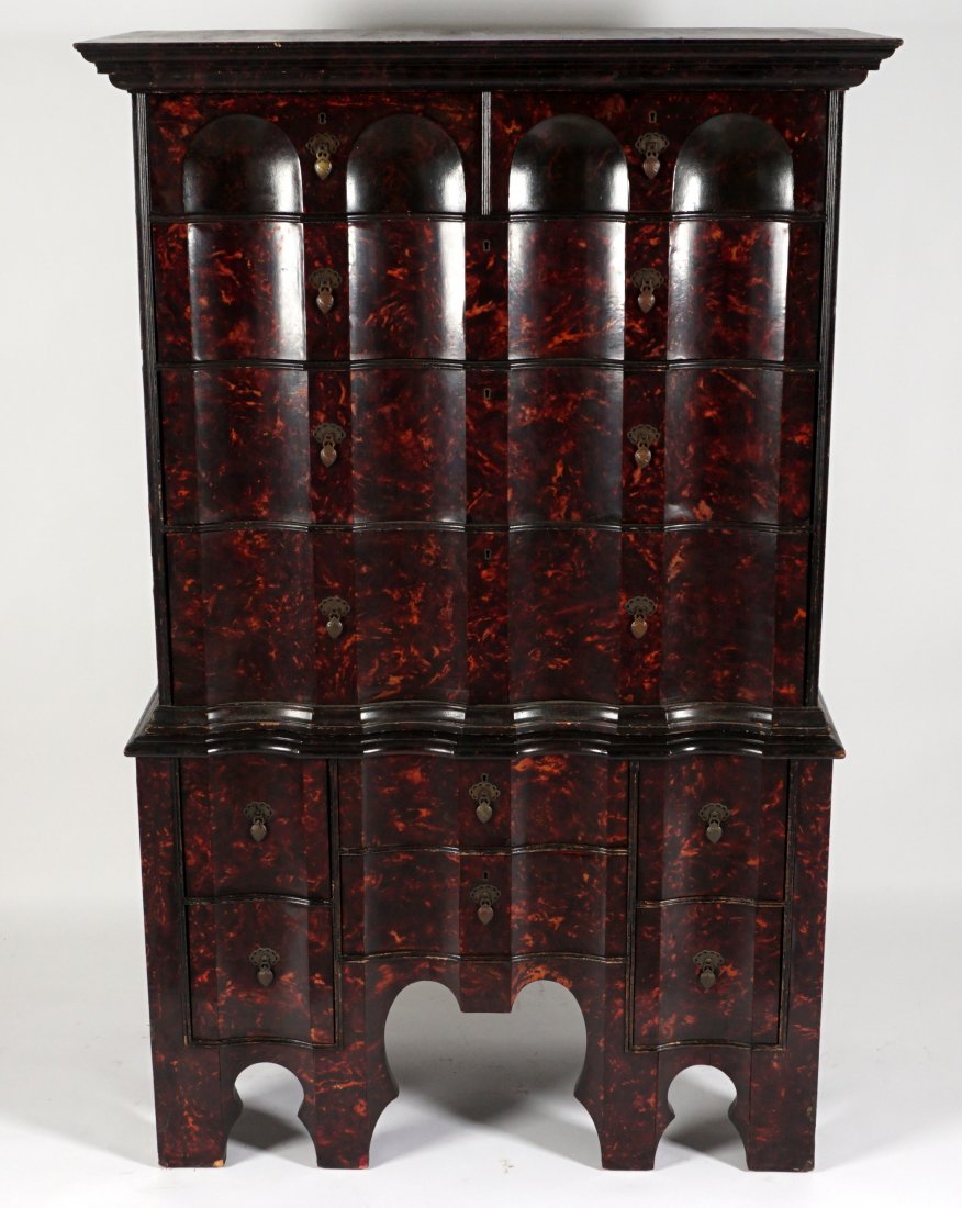 Early 20th C. Faux Tortoise Shell Highboy: Circa 1920's, Chippendale style with Gothic influences, faux tortoise shell decoration all over. Top with 2 drawers over 3 graduated drawers, base with 6 drawers, overall 67.25" h. x 43.25" x 21.5". C