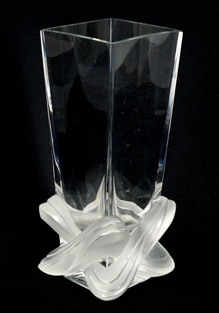 Lalique Lucca Crystal Vase: Slightly tapered square body with applied frosted ribbons at base, signed Lalique France 9" h. x 4" x 4". Condition: Fleabites to top rim and base.