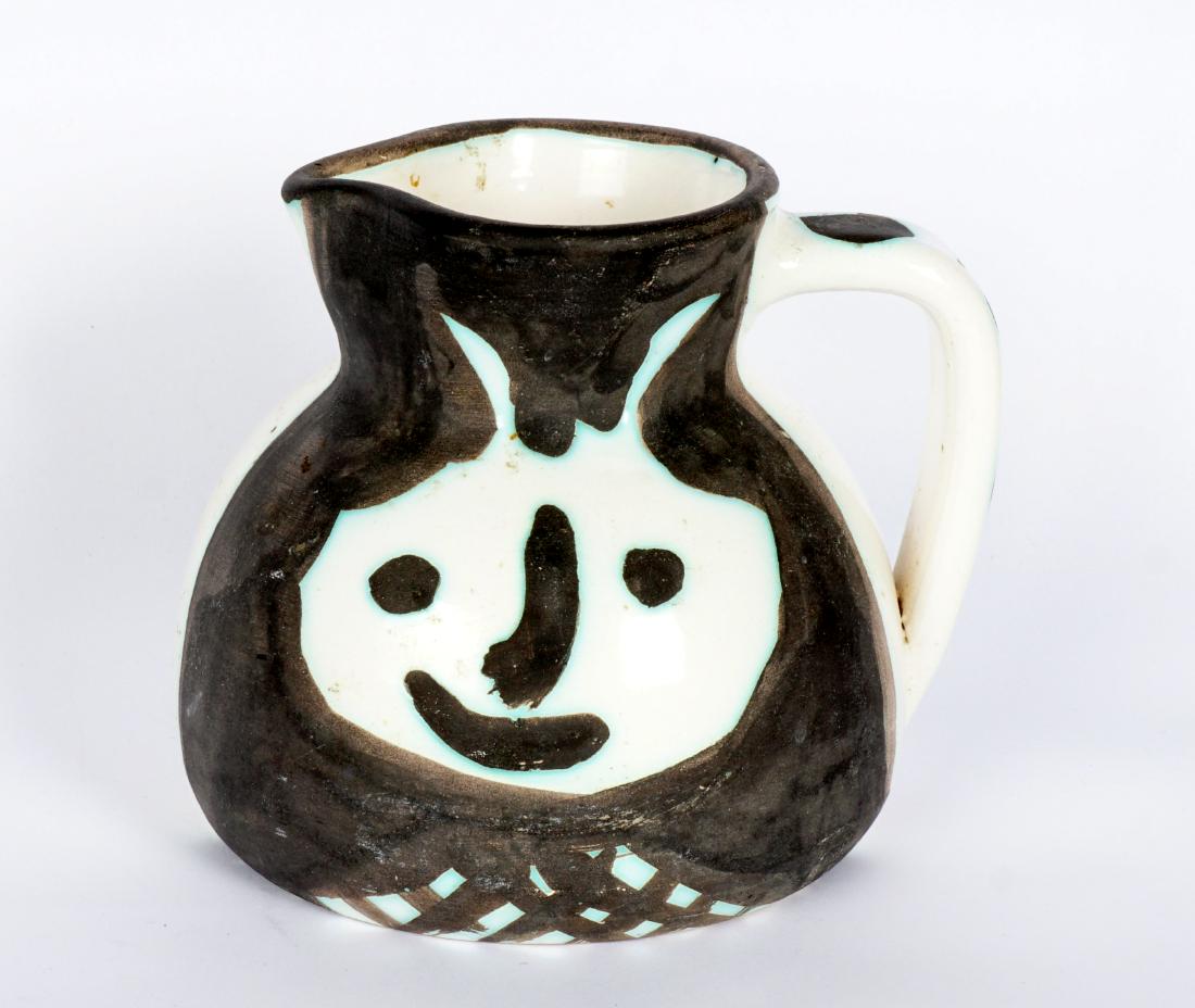Pablo Picasso 1956 Madoura Tetes Ceramic Pitcher: PICASSO, Pablo, (Spanish, 1881-1973): "Tetes" ceramic pitcher with stylized faces either side, from an edition of 500, signed "Edition Picasso" on base with impressed marks. 5" h. x 6". Condition: Inh