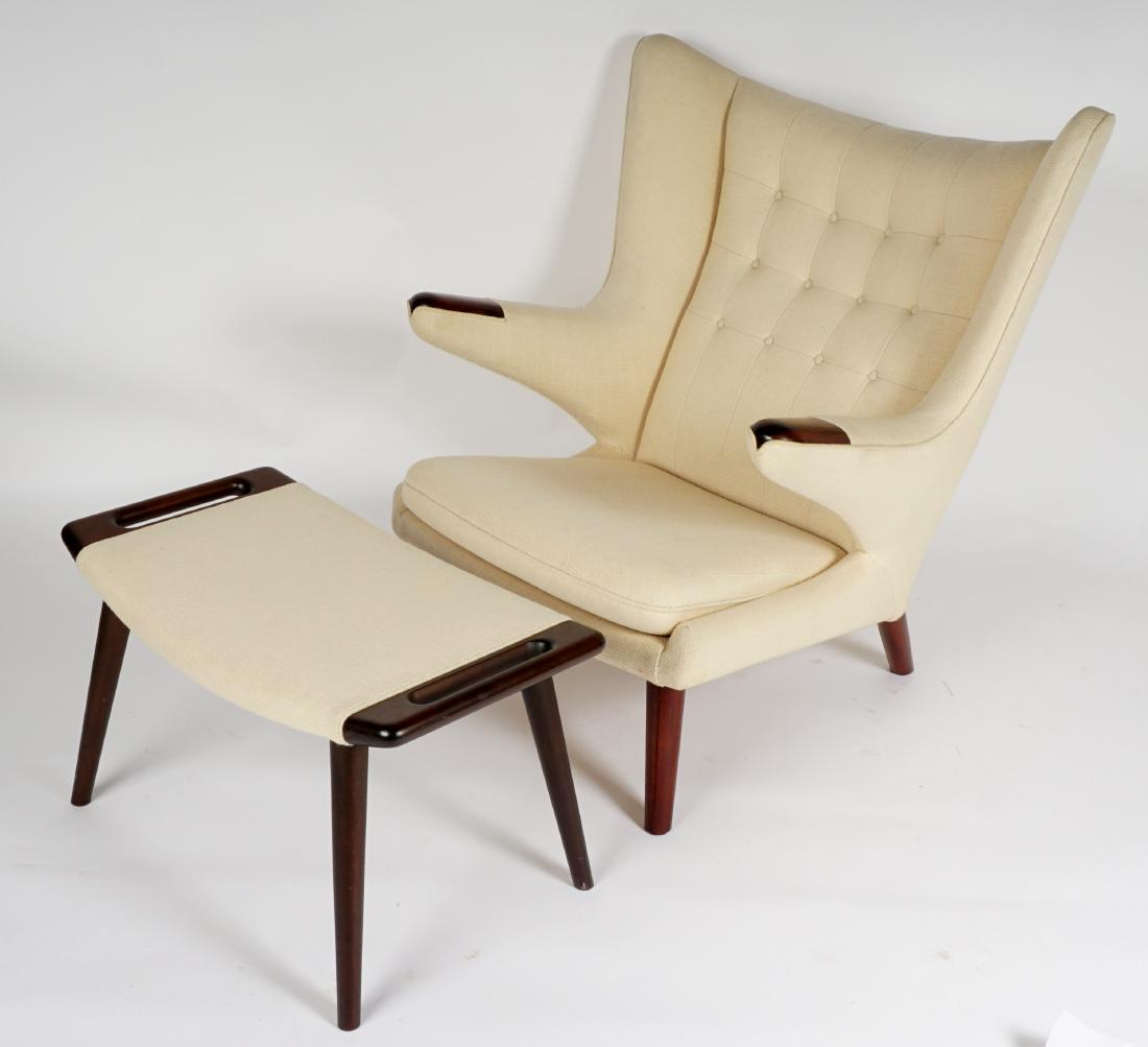 Hans Wegner Style Papa Bear Chair & Ottoman: After Hans Wegner "Papa Bear" chair and ottoman, rosewood handholds and handles to ottoman, cream / ivory tufted upholstery. Unmarked on frame or ottoman. Chair 39" h. x 35.5" x approx. 36", ottoman 1