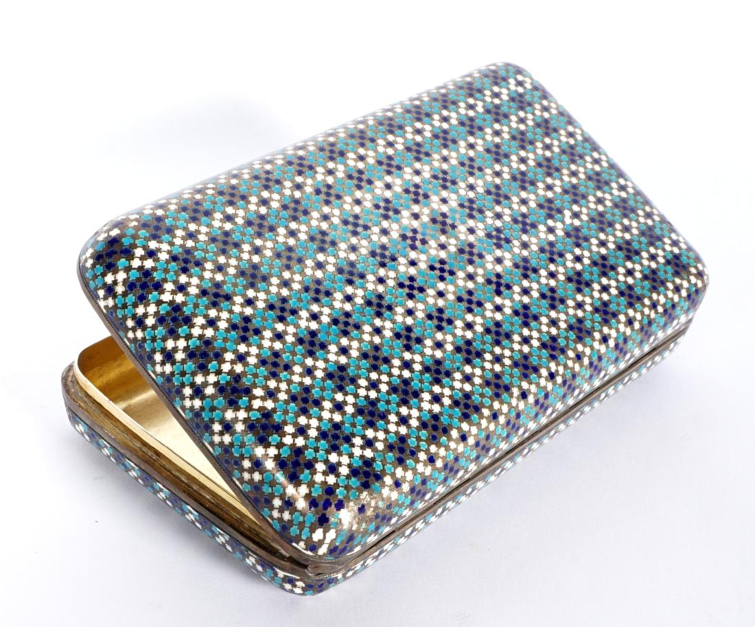 Ovchinnikov Marked Silver Enameled Cigarette Case: Hinged cigarette case with push button latch, geometric enamel design exterior, vermeil interior, bearing the mark for Pavel Ovchinnikov,1874 Viktor Savinsky assay mark, Moscow town mark, 5" x 3" x 1"