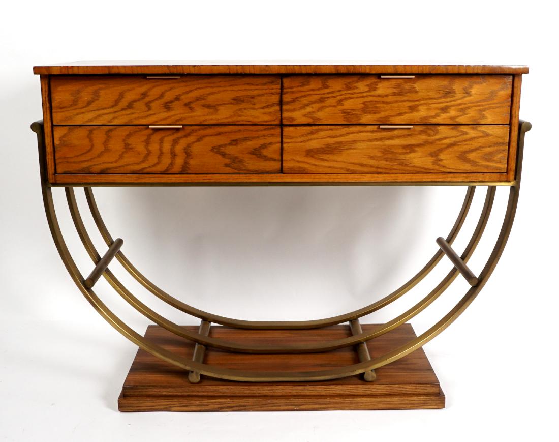 Art Deco Style Console Table: Oak rectangular top over 4 drawers, 3 curved bronzed cast iron supports over open lower shelf, no maker or dealers tag. Overall 34.5" h. x 46.5" x 18.5". Condition: Edge chips to top.