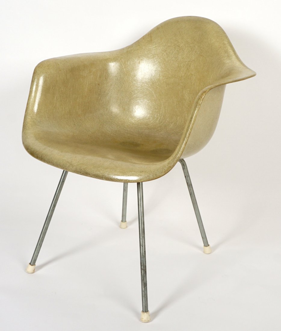 Ray and Charles Eames Herman Miller Shell Chair: Grey fiberglass arm chair, metal tube legs, partial Herman Miller and Zenith Plastics tags remain, 29.5" h .x 24.75" x 2.5".