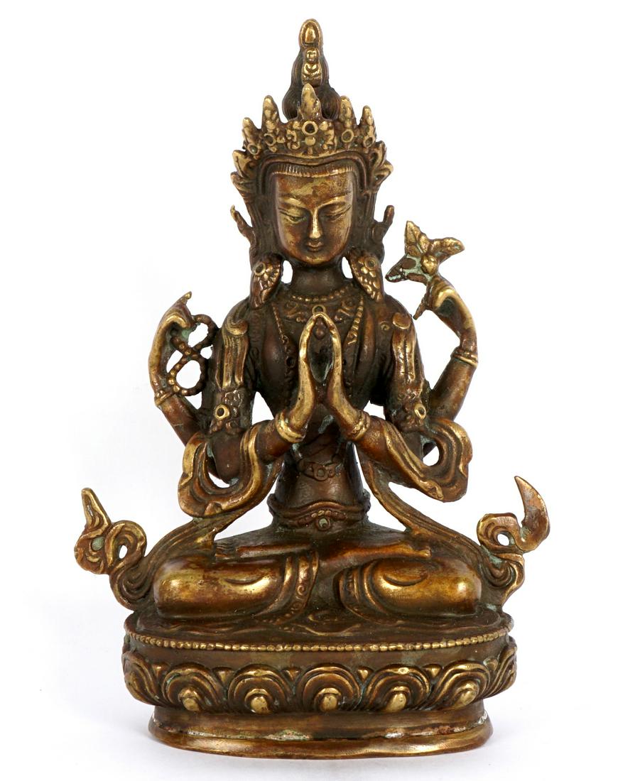 Sino-Tibetan Bronze Seated Buddha Avalokiteshvara: Figure of four armed Avalokiteshvara seated on a lotus blossom, impressed four character mark on sealed base. Overall 5.75" h. x 4" x 2.5".