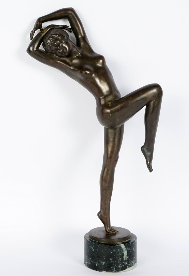 After Josef Lorenzl Bronze Nude Dancer: After LORENZL, Josef, (Austrian, 1892-1950): Patinated bronze figure of a nude dancer, signed Lorenzel on base, affixed to green marble plinth, overall 19" h. x 10.5". Condition: Uneven patina.