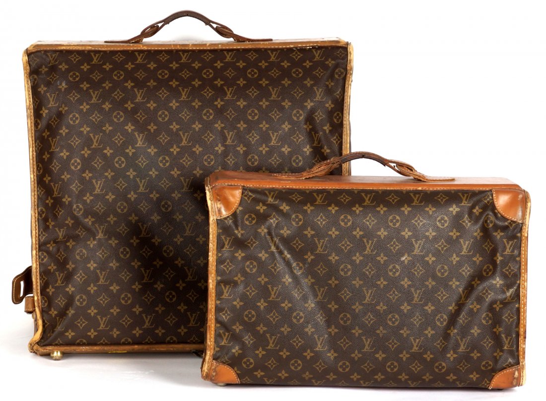Two Vintage TFLC for Louis Vuitton Luggage Bags: Two pieces total produced for Louis Vuitton under special license by The French Luggage Company to include 1) Logo canvas garment bag, leather piping, straps, and handles. Open 47" h. x 22" x 4". 2) S