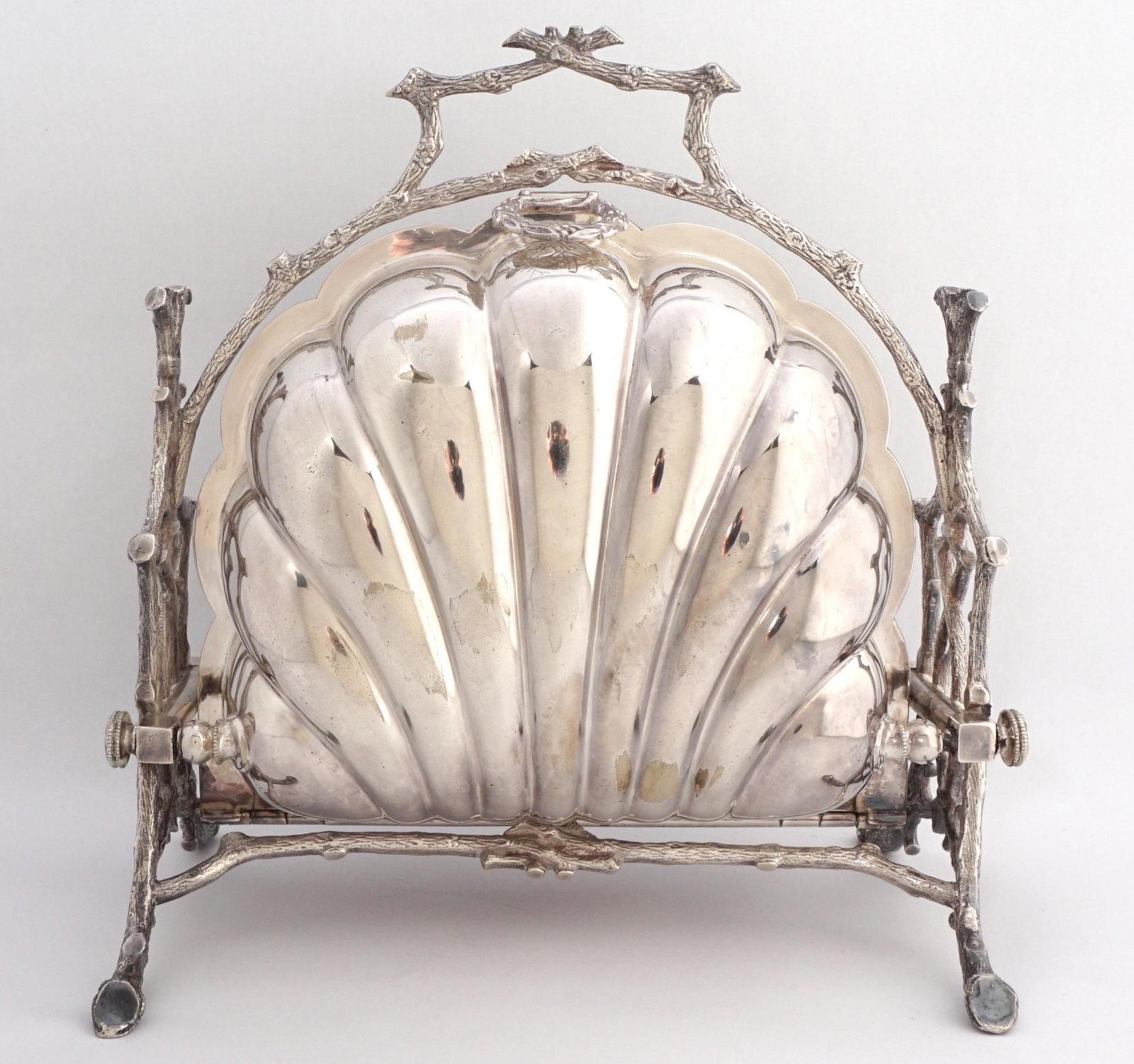 English Victorian Silver-plate Shell Biscuit Box: Late 19th to early 20th Century, folding shell form biscuit box, twig form handle and supports, Stanforths Patent, 9" h. x 8.5" x 5.5".