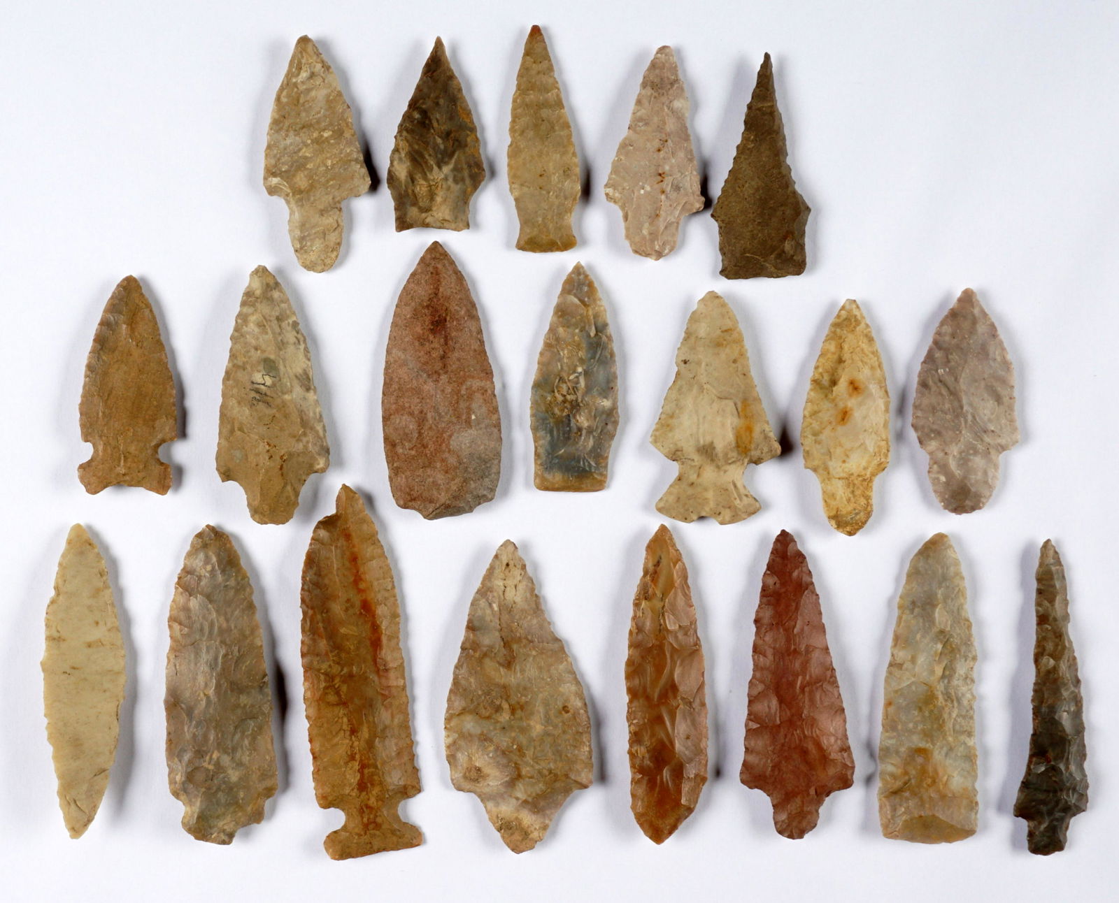 Twenty Archaic / Woodland Arrowheads Points: Ana assembled collection of twenty Archaic and Woodland period points, marked examples from Bath County and Montgomery County Kentucky, and one marked Tennessee. Longest 4.25", shortest 2". From a pro
